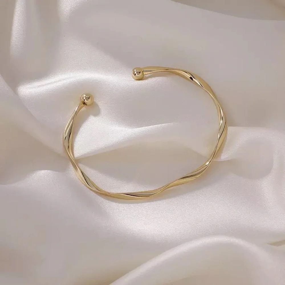“Anya” Minimalist Twist Open Adjustable Gold Neutral Fashion Simple Bracelet - Picture 3 of 9